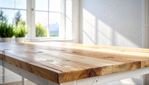 Empty rustic wooden table surface in bright room with large window background for product display