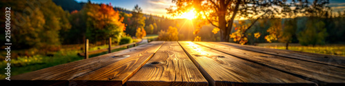 Empty wooden table perspective with autumn forest landscape at sunset background for product display　4：1
