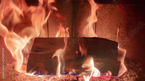 4K Close Up of Log Burning in Fireplace, Intense Flames and Embers, Cozy Indoor Ambiance, Warm Glow, Real Time Macro Footage