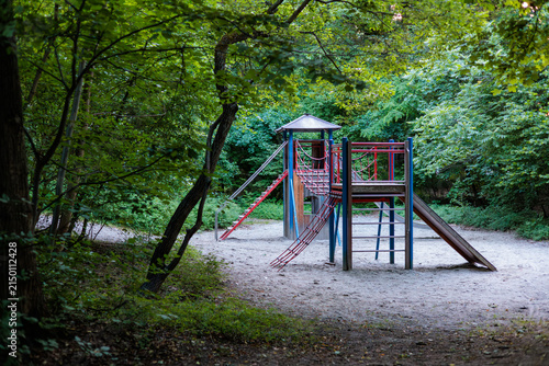 Wooden playground tucked among the trees