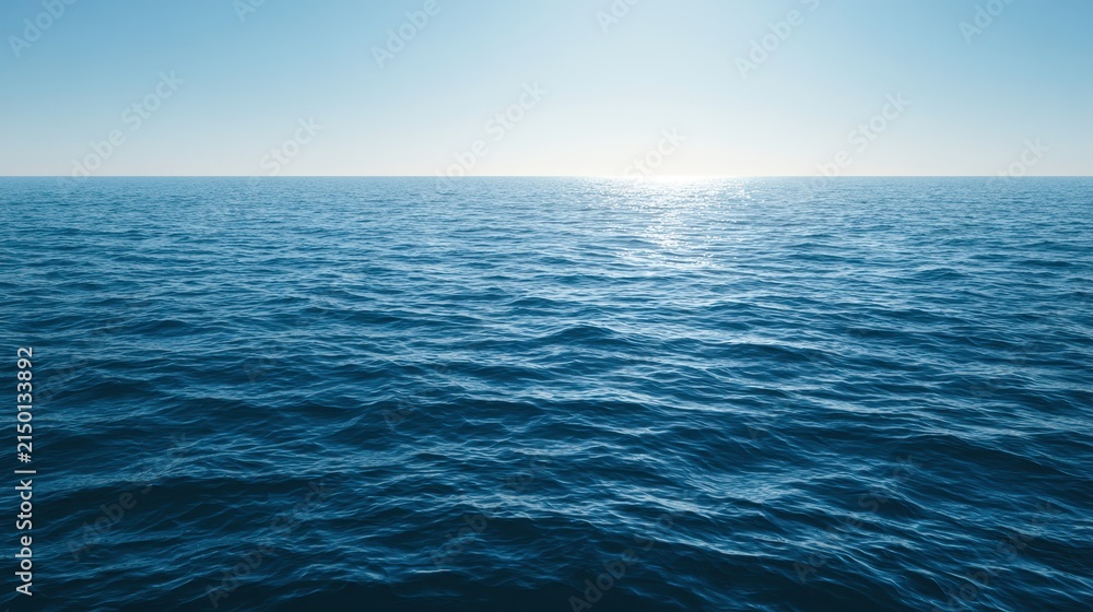 Fototapeta premium Calm blue ocean surface with gentle waves and clear sky