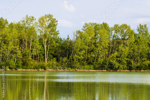 Obraz na płótnie Lac du Ramier de la Riverotte, a former gravel pit rehabilitated into a remarkab
