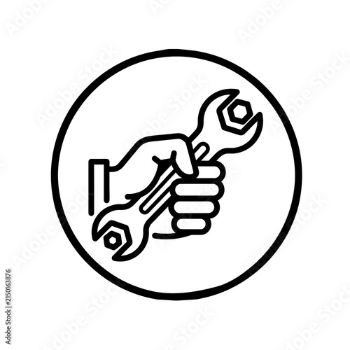 A black and white line art icon showing a human hand firmly holding a metal wrench inside a circular border for maintenance concepts