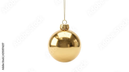 A shimmering golden christmas ornament hangs delicately representing the joy and festive spirit of the holiday season
