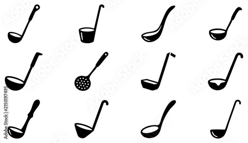Foto Set of black kitchen ladles and soup spoons for cooking and food preparation