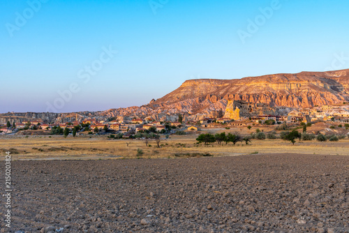 Fotografie Beautiful view of the city of Cavusin in the evening, amazing views of Cappadocia