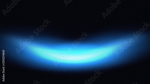 Gentle blue light arc with a bright center and diffused edges on black