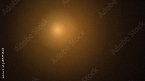 Soft diffused warm light emanating from a central point in a dark background