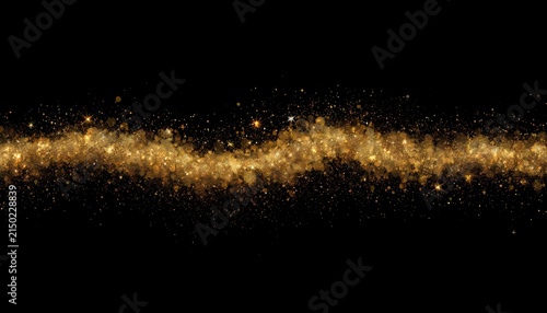 Foto Golden dust trail stretches across a black background creating a shimmering spar