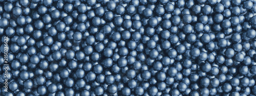 Sfere in acciaio lucido in primo piano – texture metallica industriale