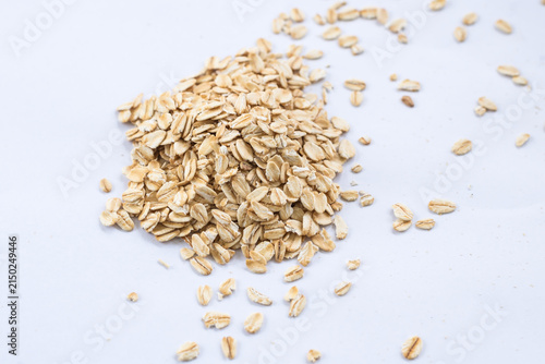 Rolled oats on white background.