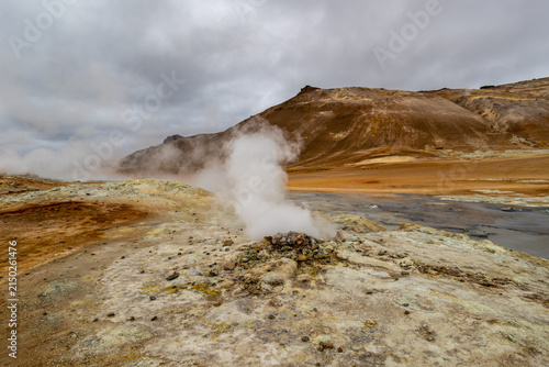 Konstfotografi Active fumarole venting white steam with yellow sulfur deposits at the base of M