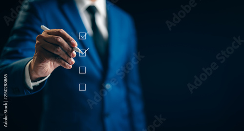 Business performance monitoring concept. Businessman online check survey filling out, digital form checklist satisfaction questionnaire and feedback report result of voting client.