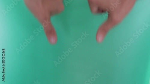Two Hands Thumbs Down Rise, Wiggle, and Exit Up on Green Screen
