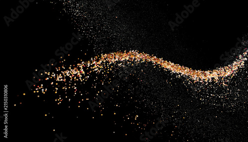 Abstract illustration of a flowing stream of colorful particles against a black background, artistic design