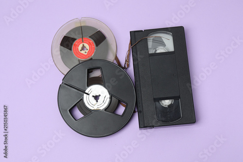 Bild auf Leinwand A video cassette against a colored background