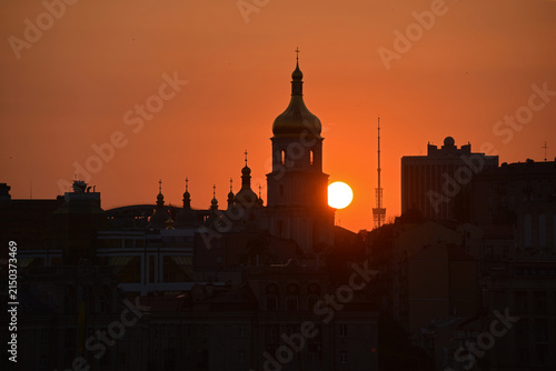 Kyiv, Ukraine - August 6, 2026: Sunset against the backdrop of St Sophia's Cathedral and the Kyiv TV Tower. The hottest day in recorded history.