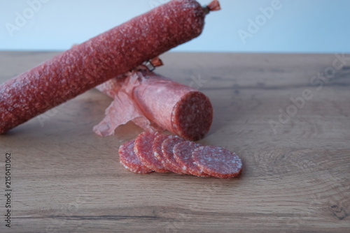 salami slices. salami slices on salami sausage background