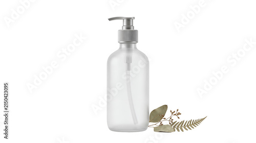 Fotografie Frosted glass pump bottle with metal dispenser and dried leaves