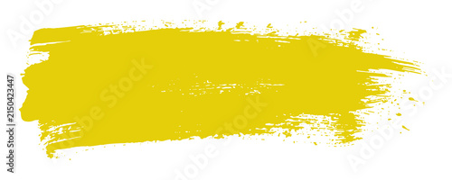 Canvas Print Vibrant yellow paint brush stroke isolated on a white background