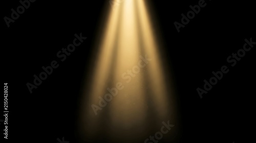 Golden stage spotlight beam with dust particles on black background