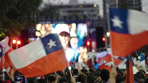 Supporters Wave Chilean Flags During Celebration After José Antonio Kast Presidential Election Victory in Chile