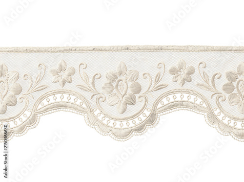 Intricate lace trim featuring elegant floral embroidery and delicate swirling patterns with scalloped edges on transparent background