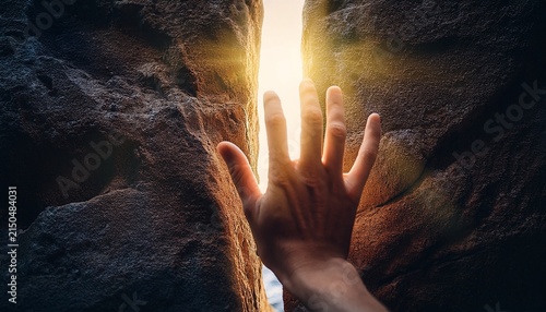hand reaches through ancient stone glowing with ethereal light