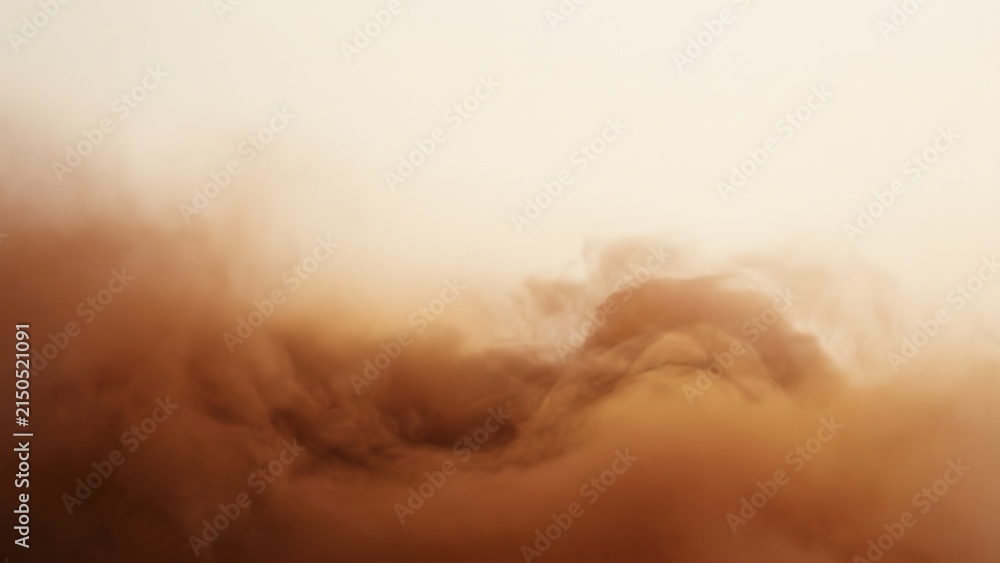 Obraz premium Brown smoke or dust swirling against a light background