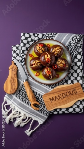 Gourmet makdous stuffed baby eggplants with walnuts and chili in olive oil, elegant traditional presentation with deep purple copy space