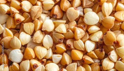 Macro shot of raw organic buckwheat groats background