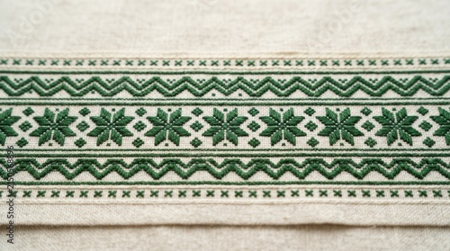 Ukraine pattern green geometric embroidery border on linen with ukrainian vyshyvanka embroidery
