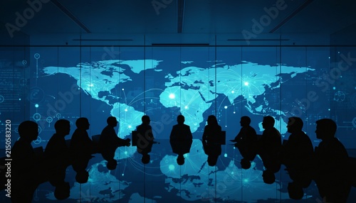 Silhouetted business people in a modern conference room looking at a digital world map projection.