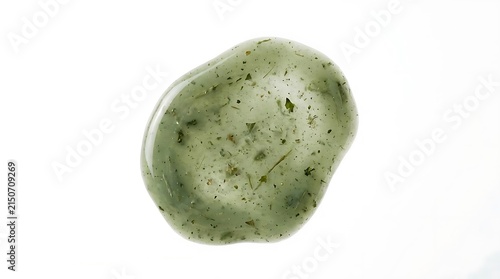 Translucent organic green jade stone isolated on white.