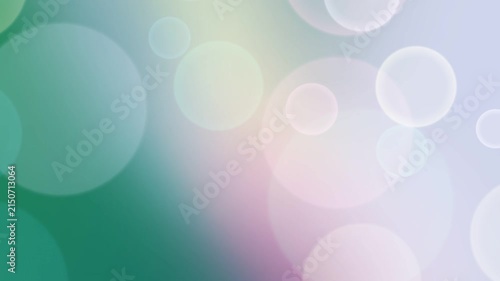 Soft blurred bokeh light background with green and purple pastel gradient overlay for festive design banners