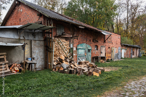 Old red brick outbuilding in a Russian village