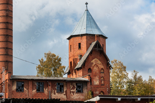 Historic red brick tower of former psychiatric hospital in Gvardeysk, Kaliningrad Oblast. Russia