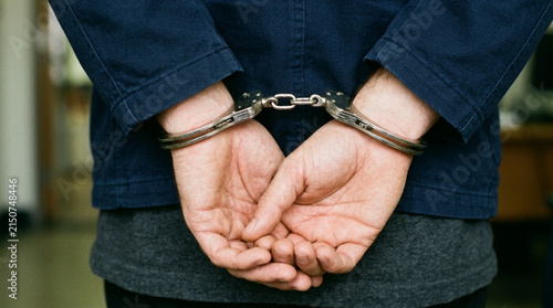 Man's Hands Cuffed Behind Back, Arrest, Detention, Crime, Justice Concept