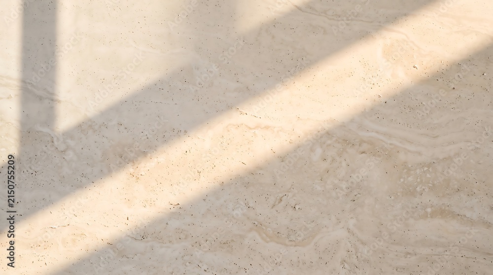 Obraz premium Warm sunlight falling across a natural travertine stone surface with porous texture, soft shadows, and earthy neutral tones for architectural and material concepts.