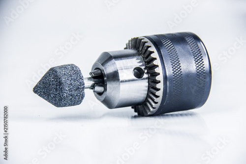 Steel Drill chuck head 13 mm, maintenance electric tools, accessory gear, studio photography shot, isolated on white background, photo is selective focus, shallow depth of field, taken at Cairo Egypt