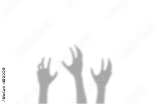 A spooky silhouette of multiple reaching human hands creating a scary horror effect presented as an isolated object on a transparent isolated on transparent background