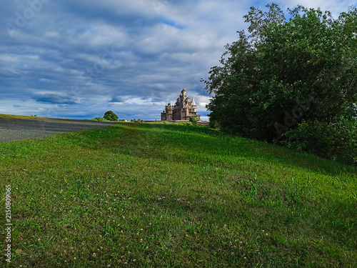 Canvas Print A traditional wooden church with onion domes.