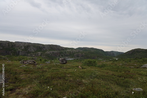 Mountain landscape along the Grense Jakobselv river in northern Norway near the Russian border.
