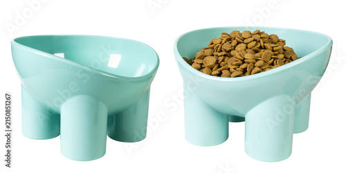 Two Modern Light Blue Elevated Plastic Pet Bowls, One Empty and One Filled with Dry Kibble Food, Isolated on Black Background