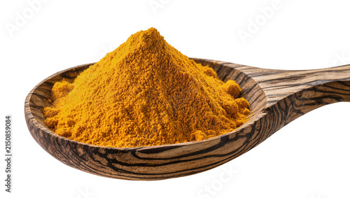 Isolated vibrant yellow turmeric powder piled in a rustic wooden spoon, culinary spice ingredient.