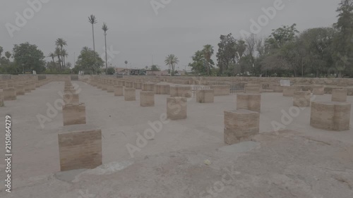 Wide pan left over Koutoubia Mosque gardens in Marrakech
