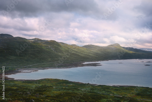 Scenic view of Tyinholmen lake and surrounding mountains, Jotunheimen NP, Norway