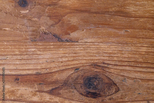 Photography Close-up of weathered wooden planks with prominent grain patterns and knots