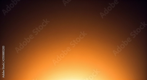 A blurred abstract image featuring a gradient of warm orange and yellow hues high-quality professional