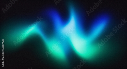 Abstract blurred background featuring vibrant shades of blue and green creating a dynamic effect high-quality
